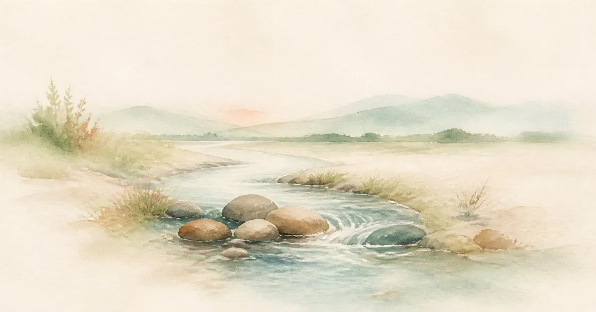 Watercolour of a gentle stream curving around smooth river stones in a soft green valley